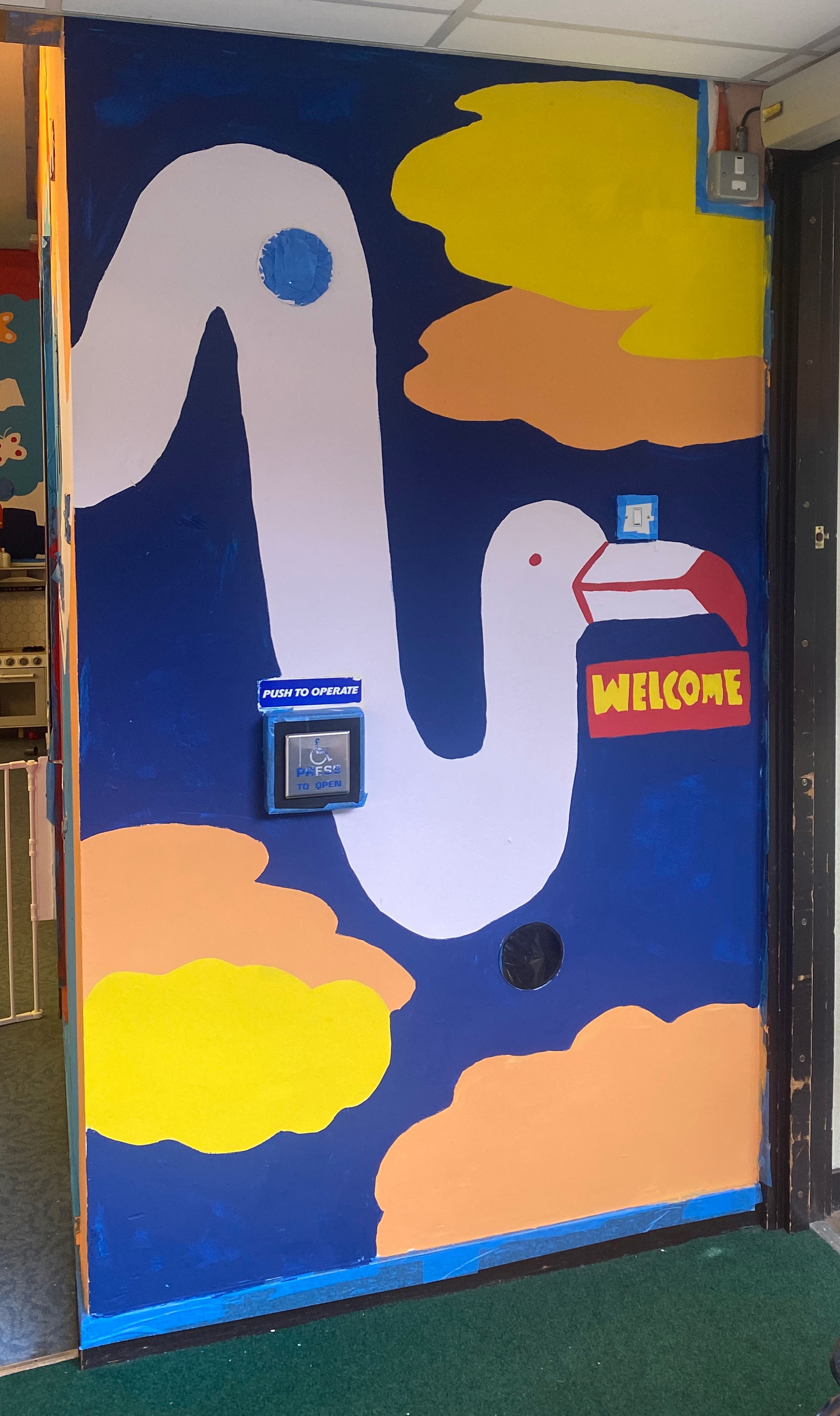 Blue flamingo wall at the Boomerang Centre.